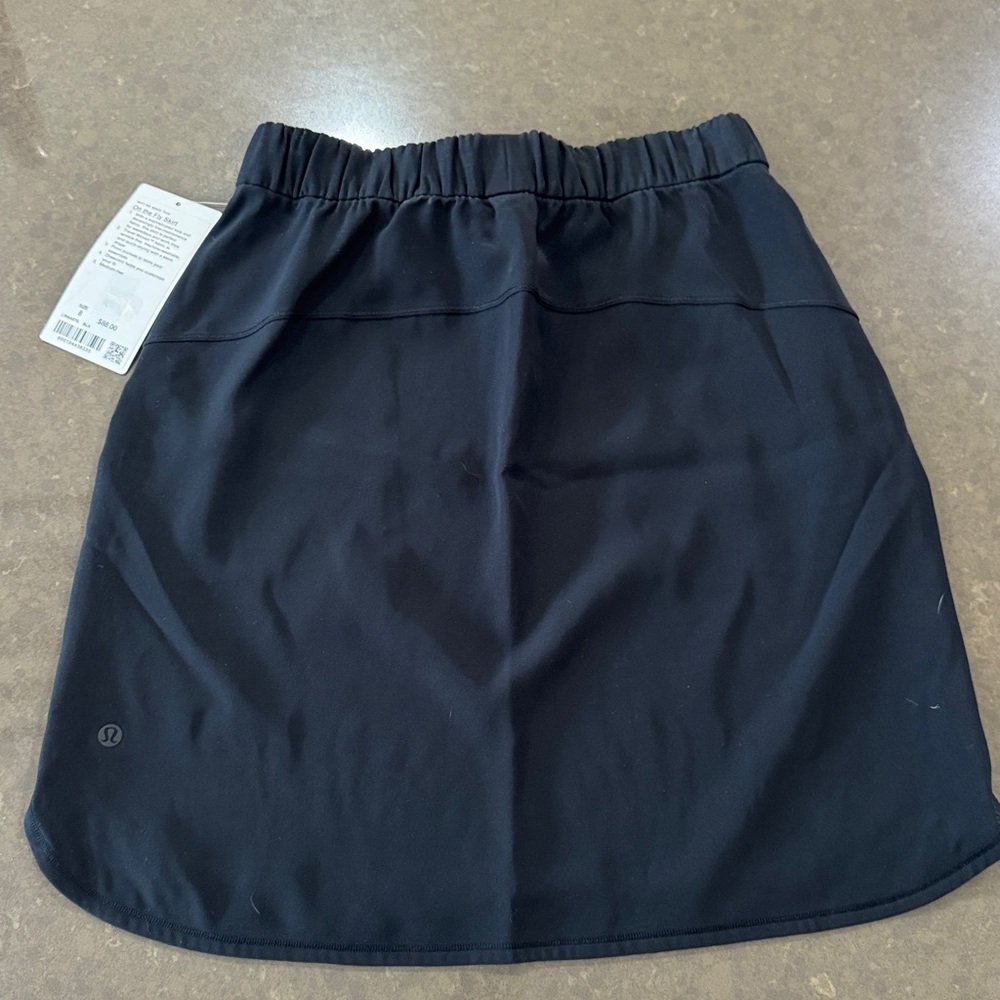 New with tags Lululemon black on the fly skirt. Size 8. - Picture 3 of 3